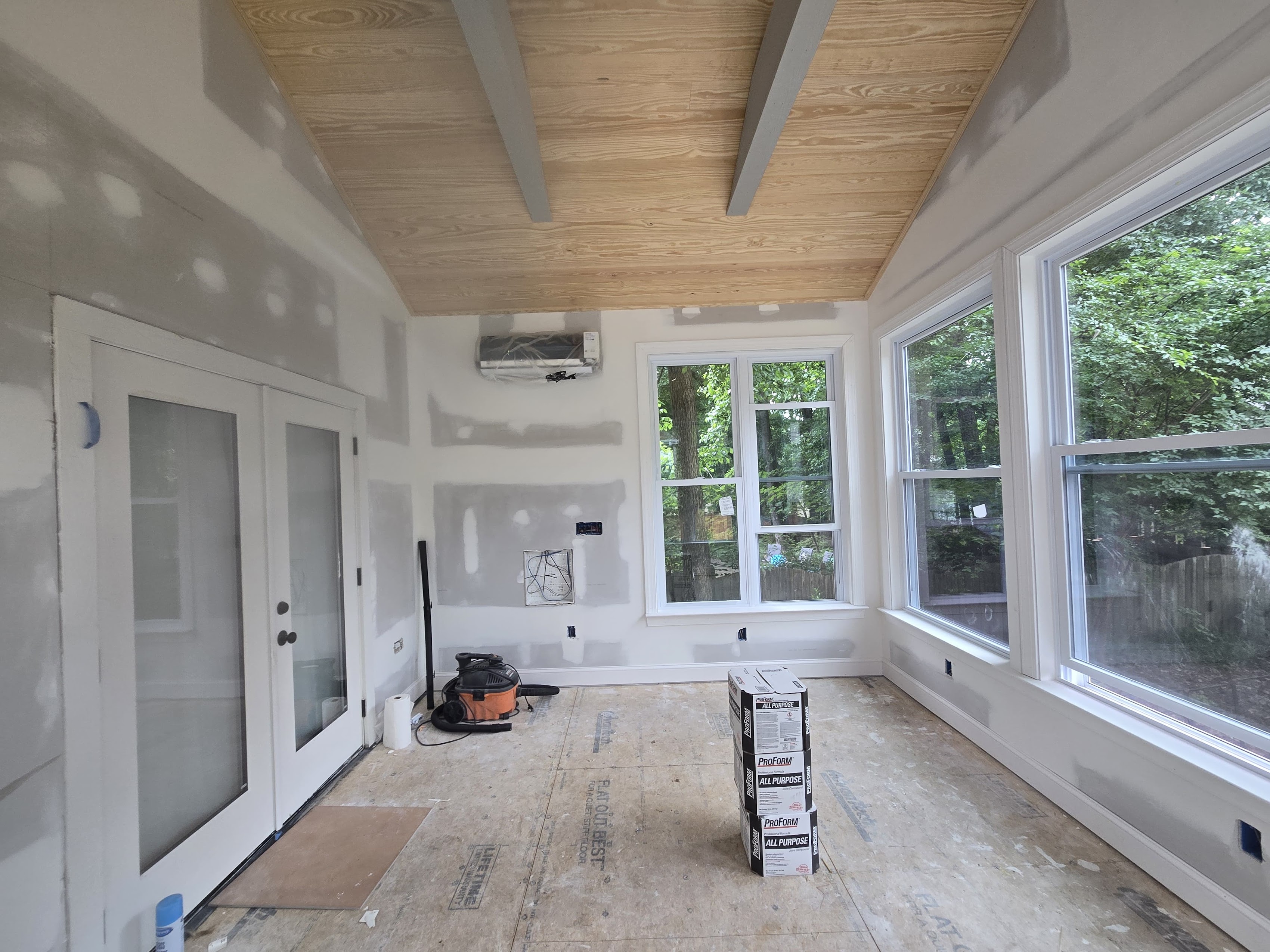 Three season room tile flooring and seating